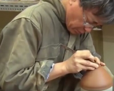 A potter challenging to replicate Yohen Tenmoku tea bowls