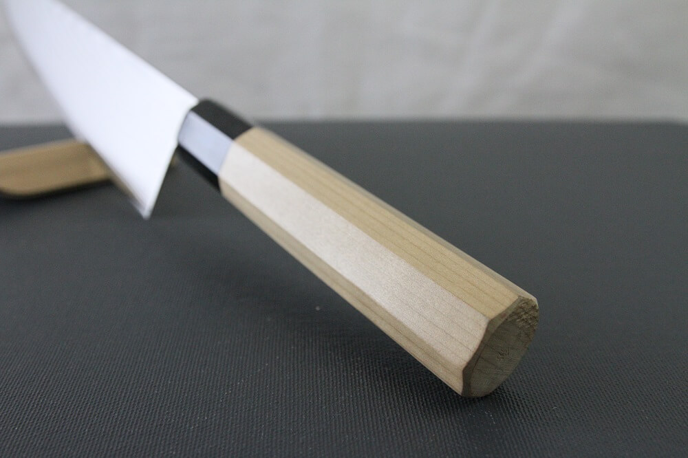 spsantoku_dam8_IMG_6177 Toshu Santoku multi-purpose Japanese chef's knife, damascus blade and octagonal wood handle, details of handle bottom view