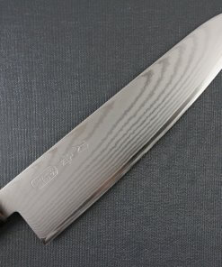 Toshu Santoku multi-purpose Japanese chef's knife, octagonal wood handle, details of damascus blade front side