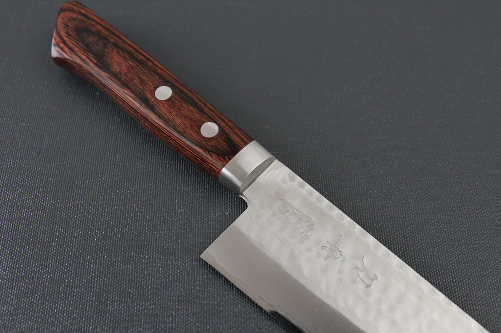 spsantoku_hamfin_maho_IMG_6231 Toshu Santoku multi-purpose Japanese chef's knife, hammered finish blade and mahogany handle, diagonal front view