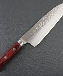 Toshu Santoku multi-purpose Japanese chef's knife, hammered finish blade and red handle, entire front view