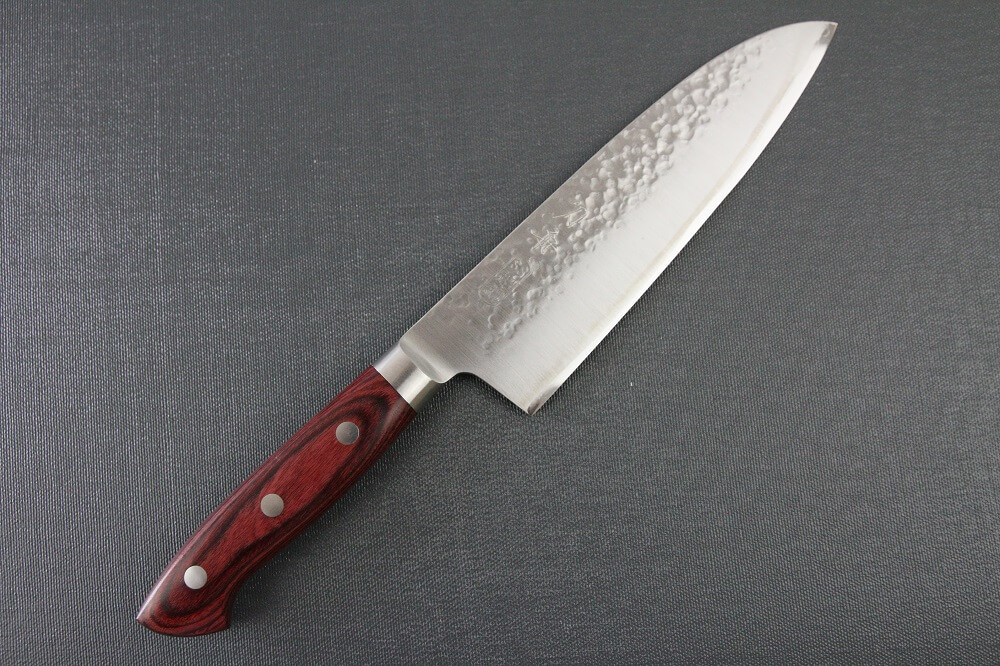 spsantoku_hamfin_red_IMG_6215 Toshu Santoku multi-purpose Japanese chef's knife, hammered finish blade and red handle, entire front view